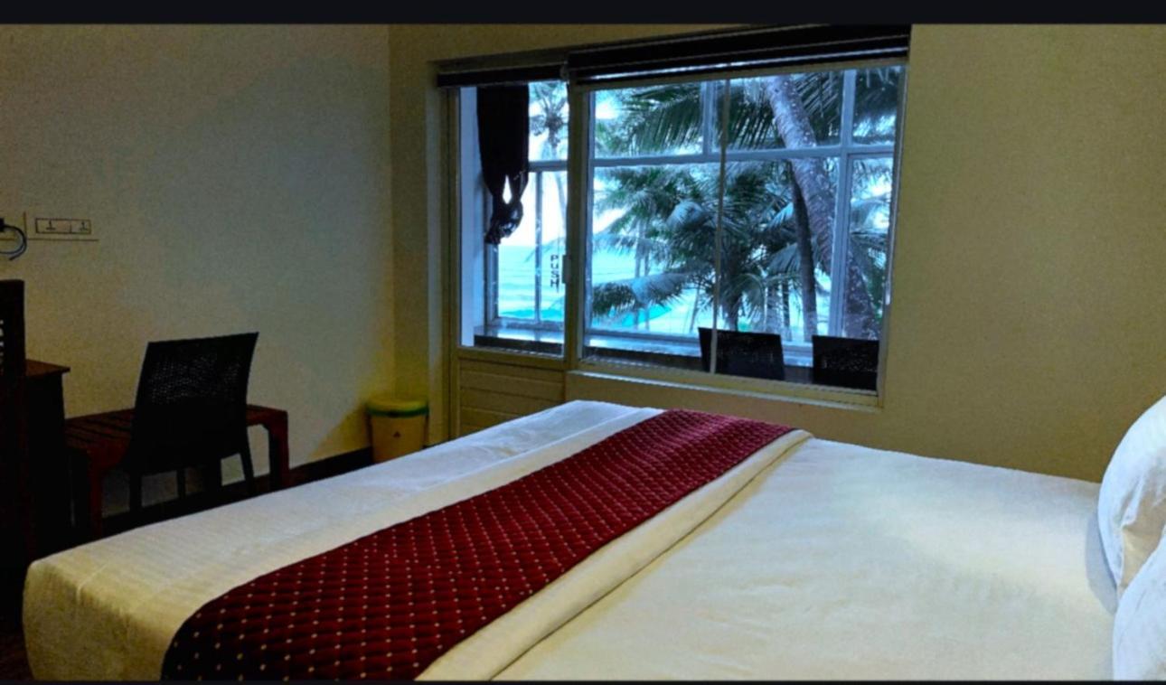 White Shell Beach House Каннур Экстерьер фото